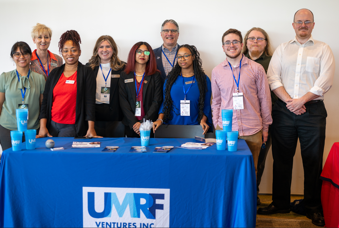 UMRF Ventures employees at a career fair event